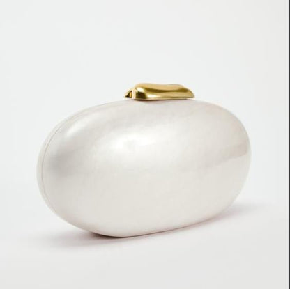 Elegant evening clutch with satin finish and gold clasp