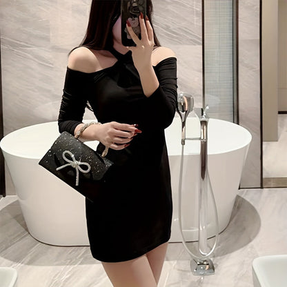 Elegant glitter evening clutch with diamond-studded bow design