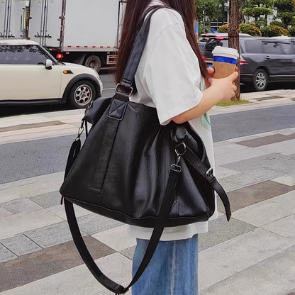 Spacious Black PU Tote Bag with Adjustable Strap and Compartments
