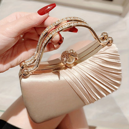 Elegant peach evening clutch with golden accents for weddings