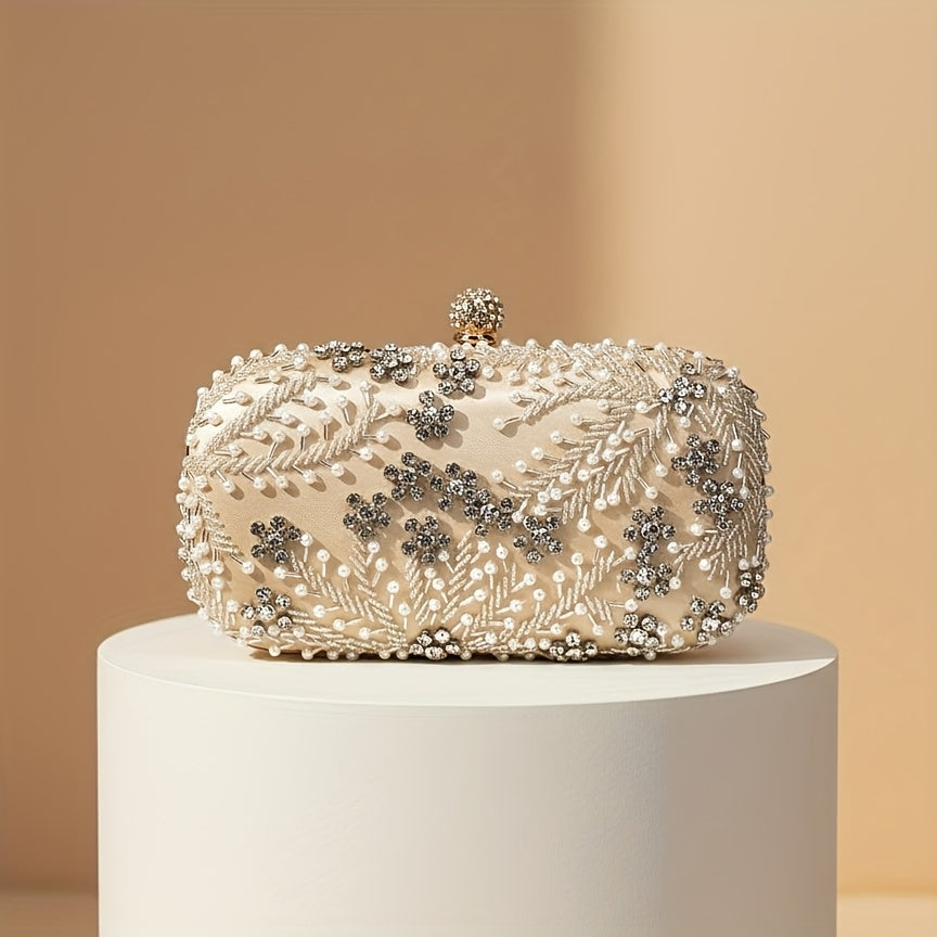 Elegant black satin clutch with rhinestone embellishments and chain