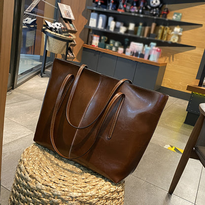 Elegant vintage red leather tote with large capacity design