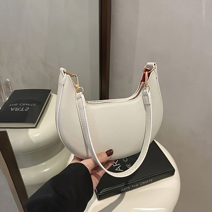 Luxurious women's crescent handbag with adjustable shoulder strap