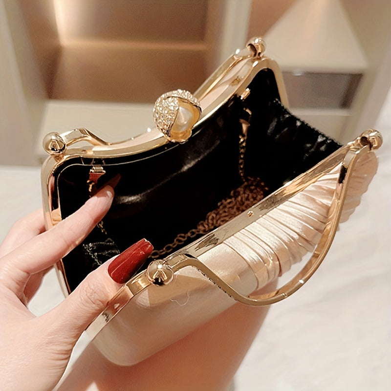 Elegant peach evening clutch with golden accents for weddings