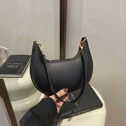 Luxurious women's crescent handbag with adjustable shoulder strap