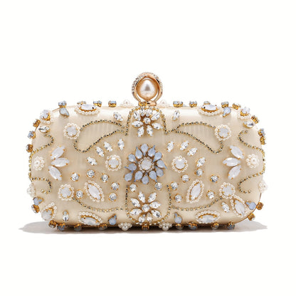 Elegant black satin clutch with rhinestone embellishments and chain