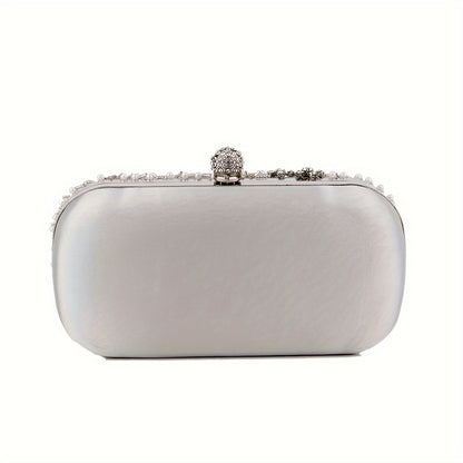 Elegant black satin clutch with rhinestone embellishments and chain