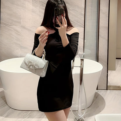 Elegant glitter evening clutch with diamond-studded bow design