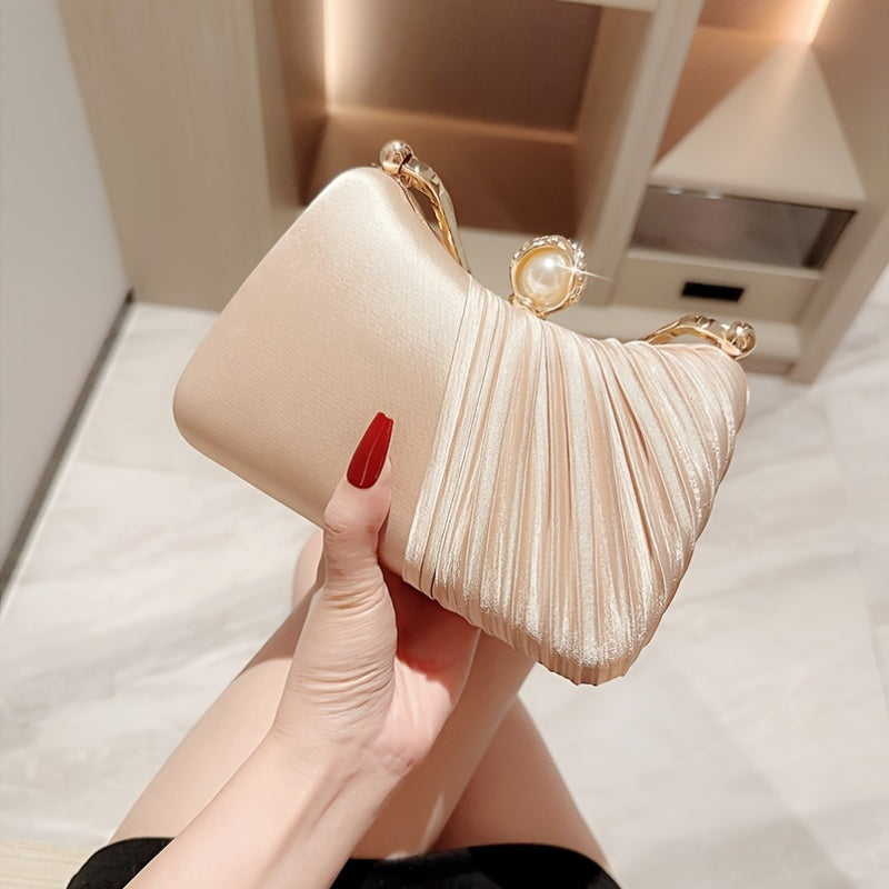 Elegant peach evening clutch with golden accents for weddings