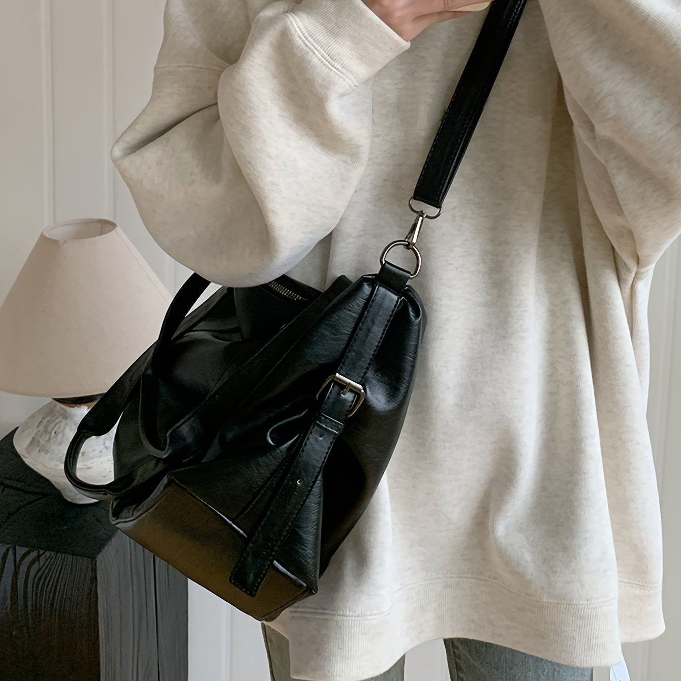 Spacious Black PU Tote Bag with Adjustable Strap and Compartments