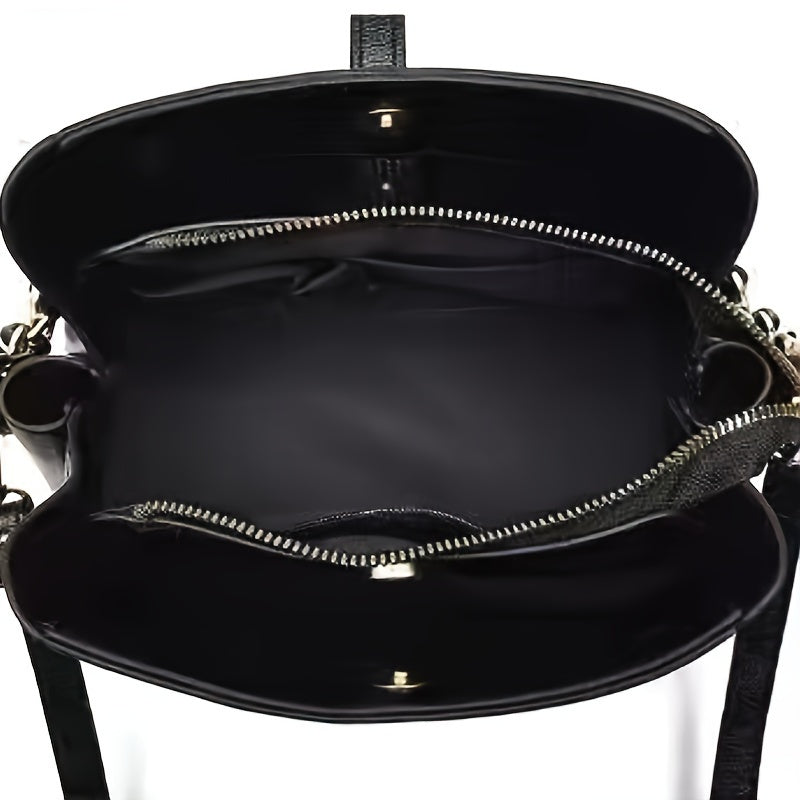 Elegant black crossbody bag with adjustable strap and gold hardware