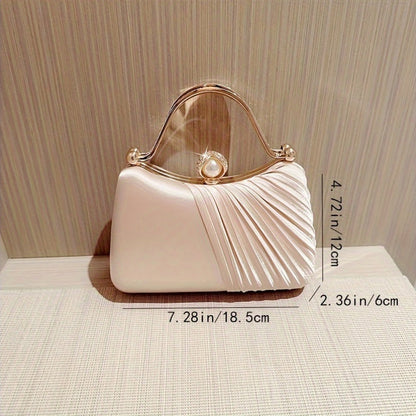 Elegant peach evening clutch with golden accents for weddings