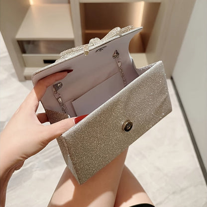Elegant glitter evening clutch with diamond-studded bow design
