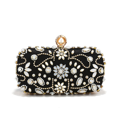 Elegant black satin clutch with rhinestone embellishments and chain