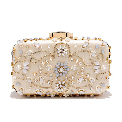 Elegant black satin clutch with rhinestone embellishments and chain