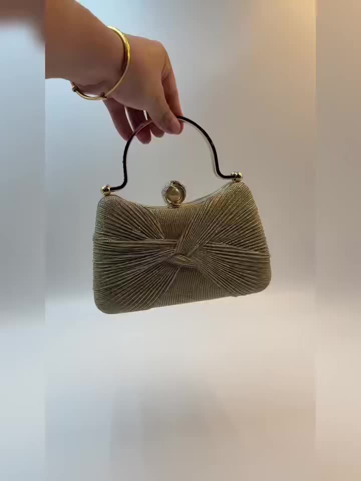 Elegant golden clutch purse with detachable strap for events